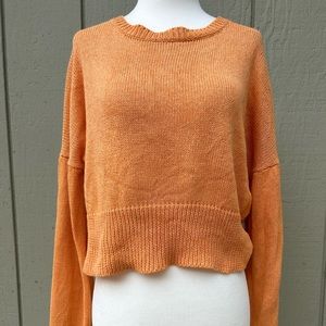 Atelier Delphine cropped recycled paper blends sweater in orange. Size S